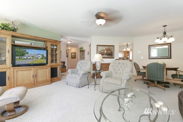8970 Postma Road Moxee, WA 98936 - Photo 13 of 31 a living room with furniture and a flat screen tv