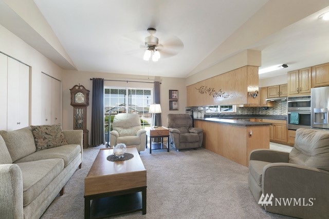 8970 Postma Road Moxee, WA 98936 - Photo 15 of 31 a living room with furniture and kitchen view