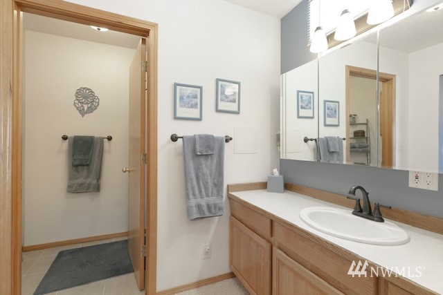 8970 Postma Road Moxee, WA 98936 - Photo 21 of 31 a bathroom with a sink and a mirror