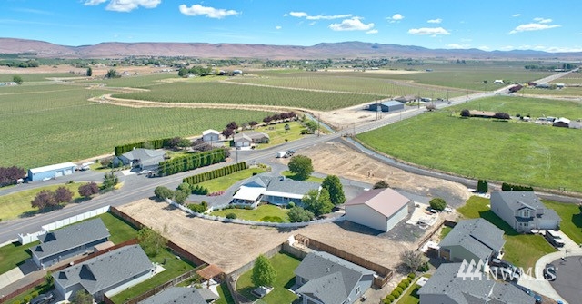 8970 Postma Road Moxee, WA 98936 - Photo 9 of 31 an aerial view of a city with lake view