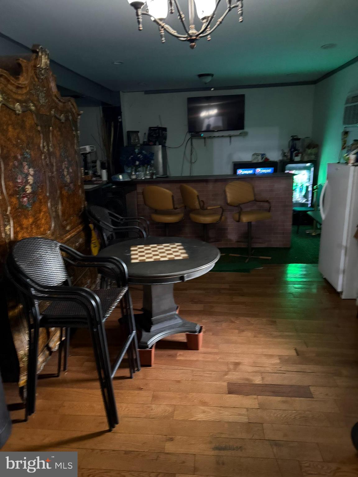 16 North 9th Street Darby, PA 19023 - Photo 16 of 20 a living room with furniture and a wooden floor