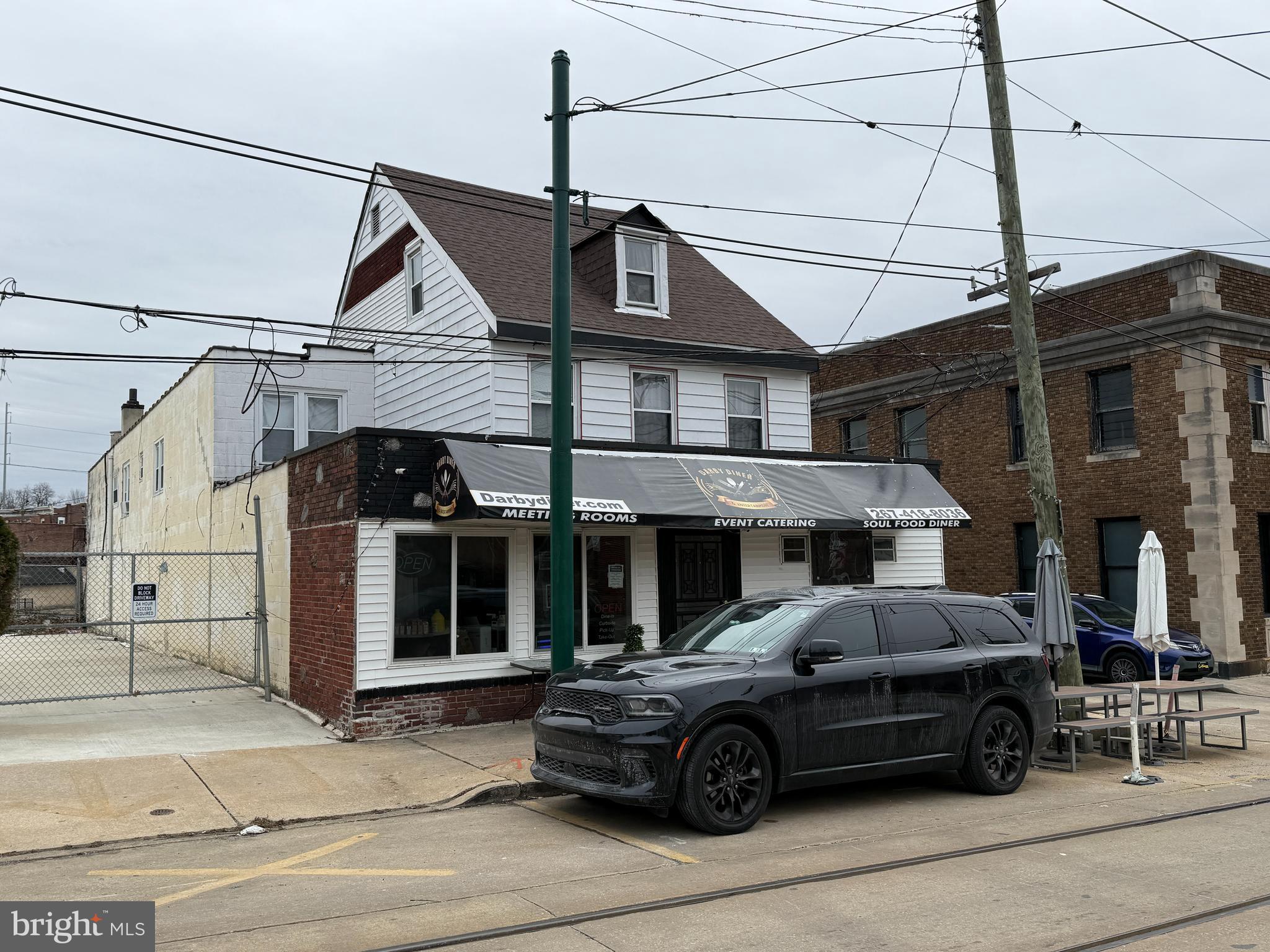 16 North 9th Street Darby, PA 19023 - Photo 7 of 20 a car parked in front of a house