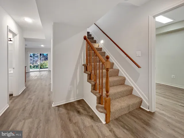 a kitchen with a sink a stove and refrigerator