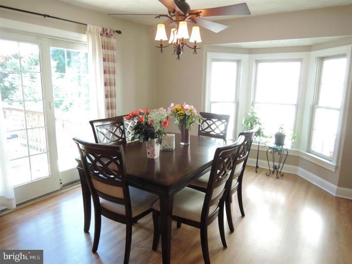 3439 Brookhaven Road Pasadena, MD 21122 - Photo 3 of 5 Dining room with sliders to deck.
