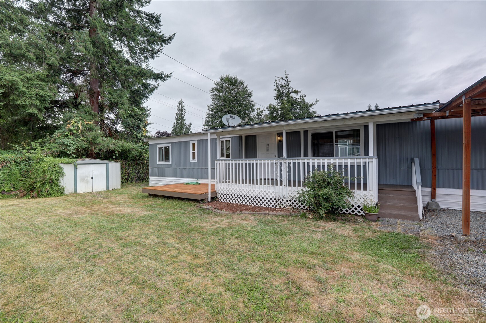 32501 Northeast 50th Street, Unit 6 Carnation, WA 98014 - Photo 1 of 13 a view of a house with a yard
