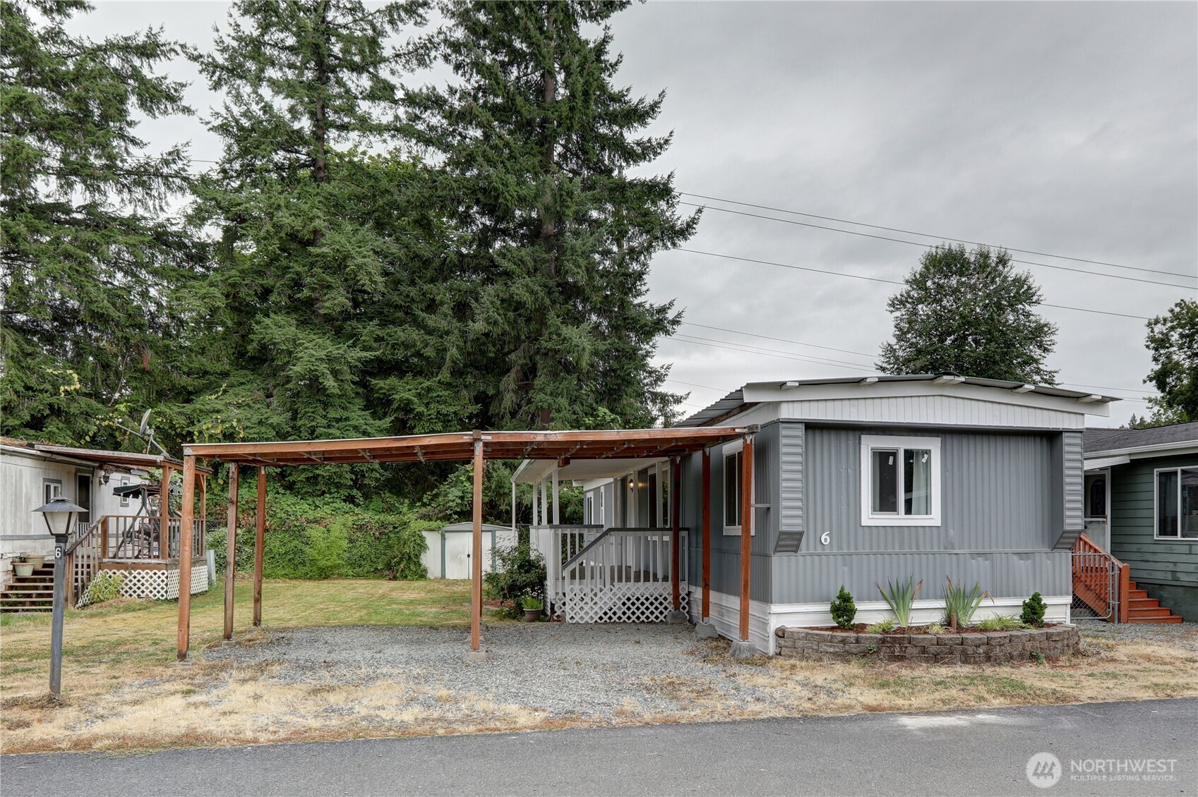 32501 Northeast 50th Street, Unit 6 Carnation, WA 98014 - Photo 2 of 13 a view of a house with a outdoor space