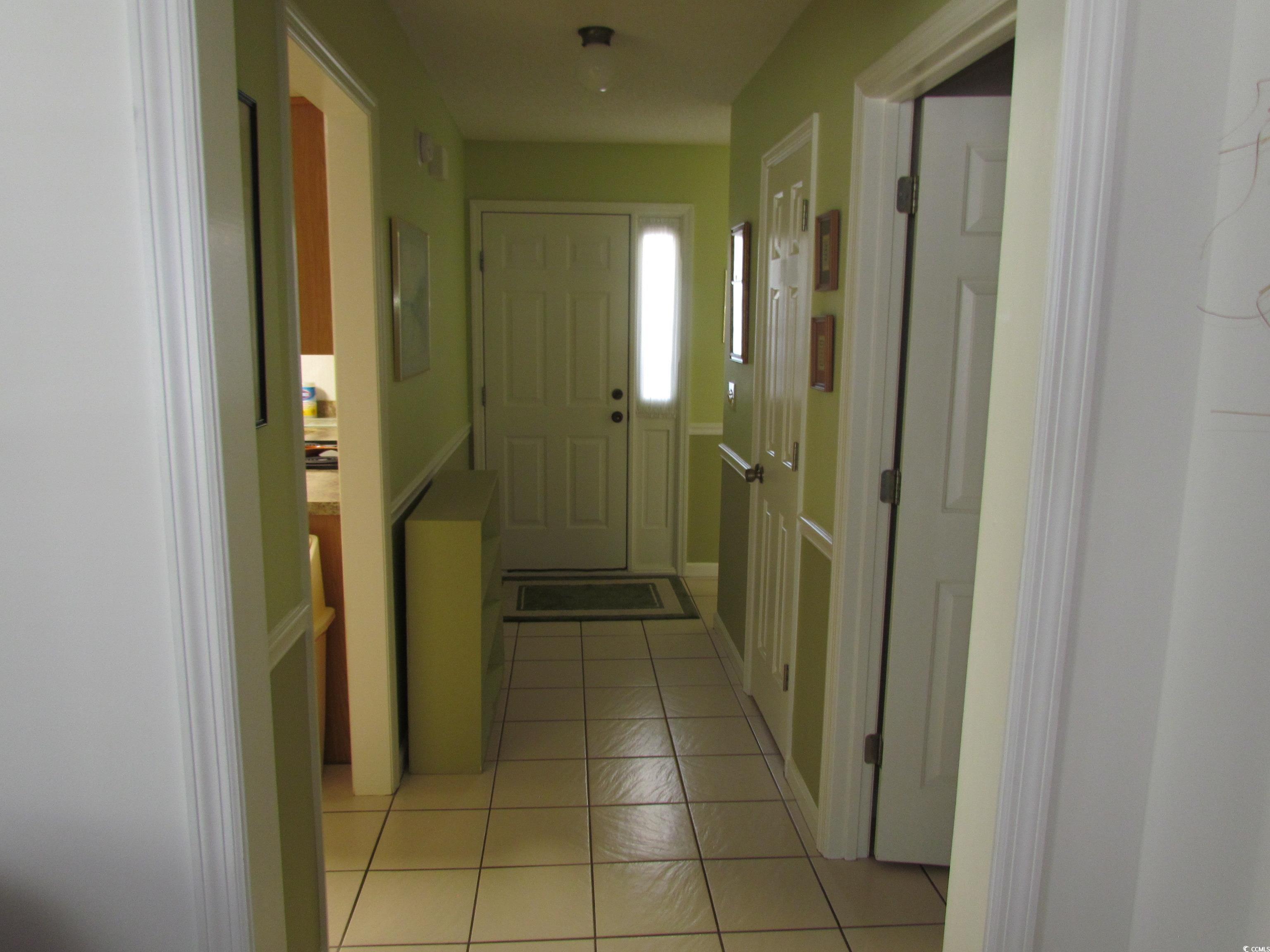100 Inverness Court Myrtle Beach, SC 29588 - Photo 13 of 22 Corridor with light tile patterned flooring
