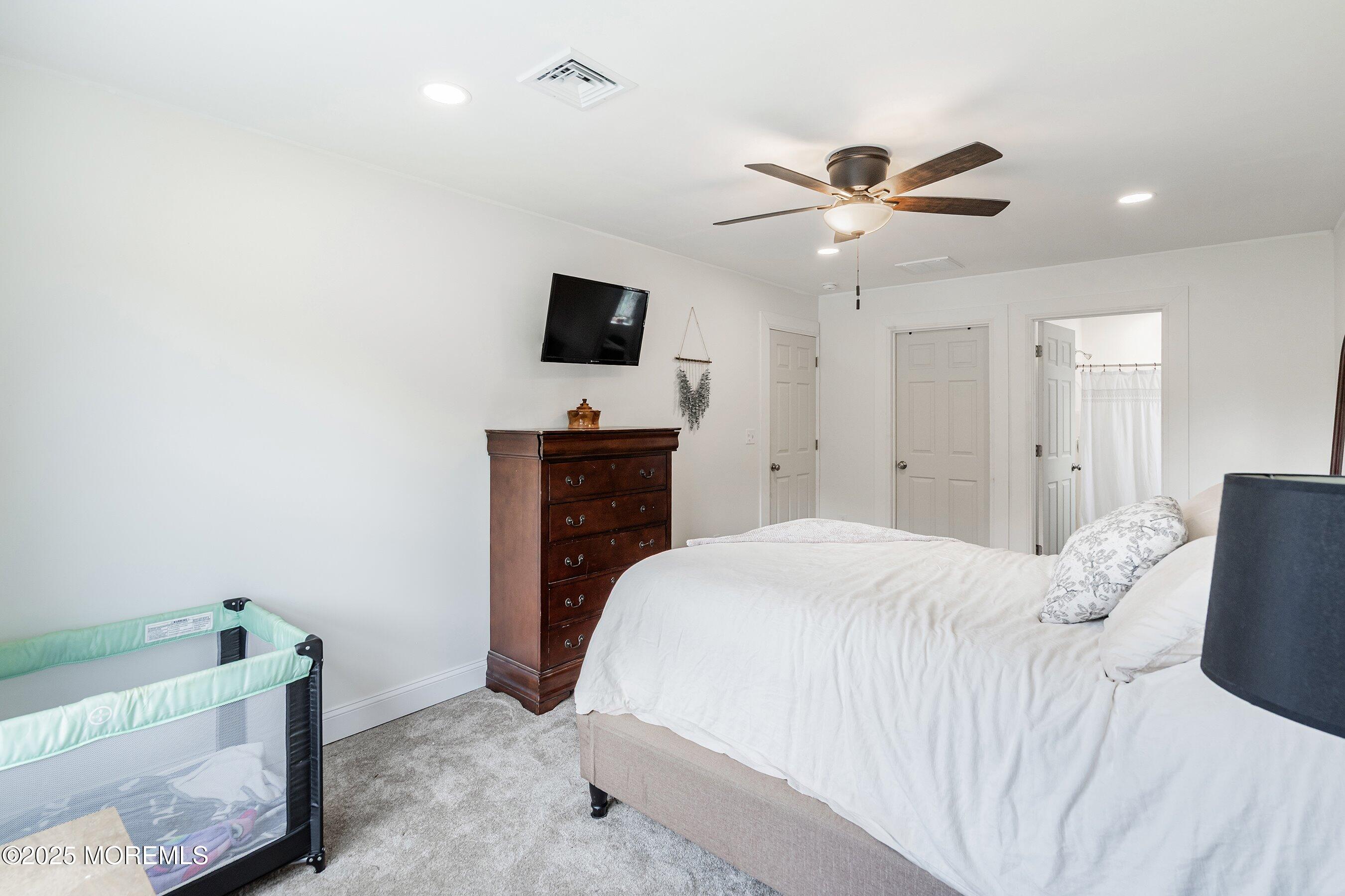 92 Jacobstown Road New Egypt, NJ 08533 - Photo 15 of 27 a bedroom with a bed and a tv