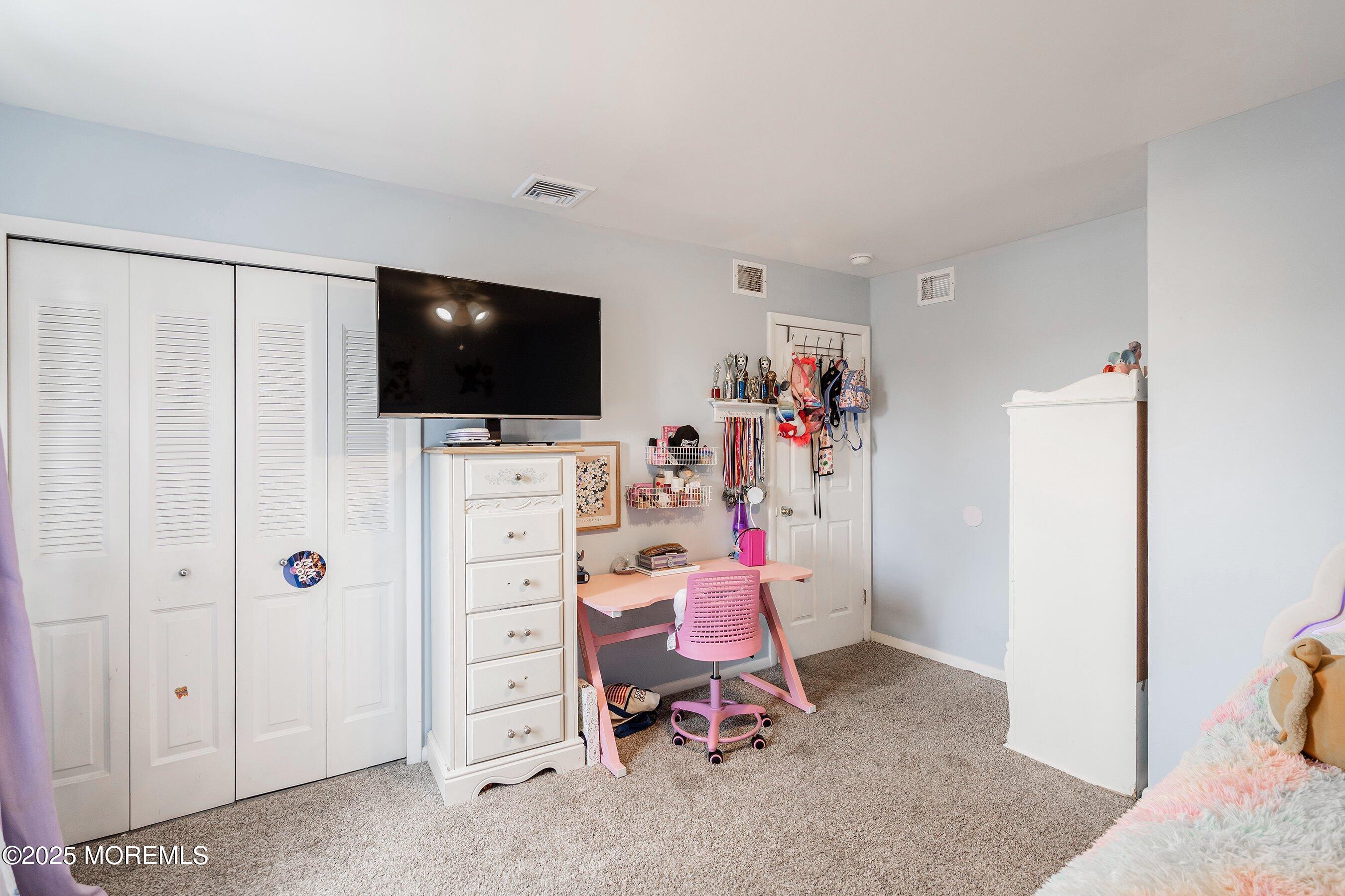 92 Jacobstown Road New Egypt, NJ 08533 - Photo 19 of 27 a view of a livingroom with a flat screen tv