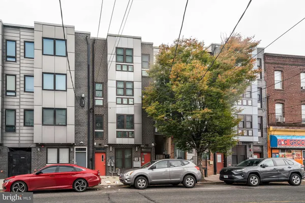 a cars parked in front of a building