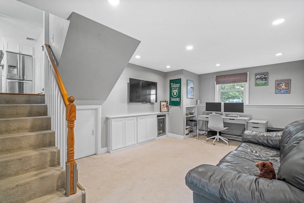 10 Winslow Road Natick, MA 01760 - Photo 13 of 20 a living room with furniture and a large window