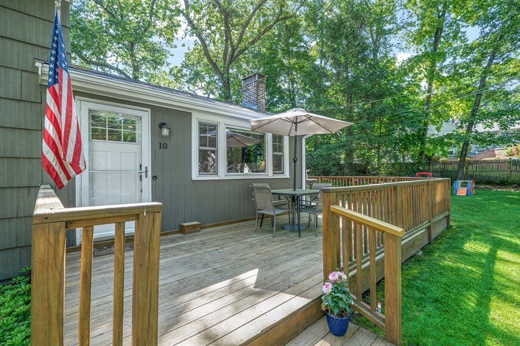 10 Winslow Road Natick, MA 01760 - Photo 20 of 20 a view of a chair and table on the wooden deck