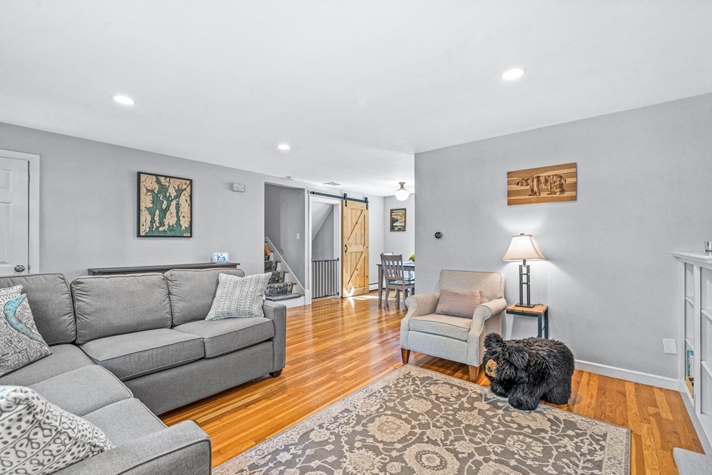 10 Winslow Road Natick, MA 01760 - Photo 3 of 20 a living room with furniture and a lamp