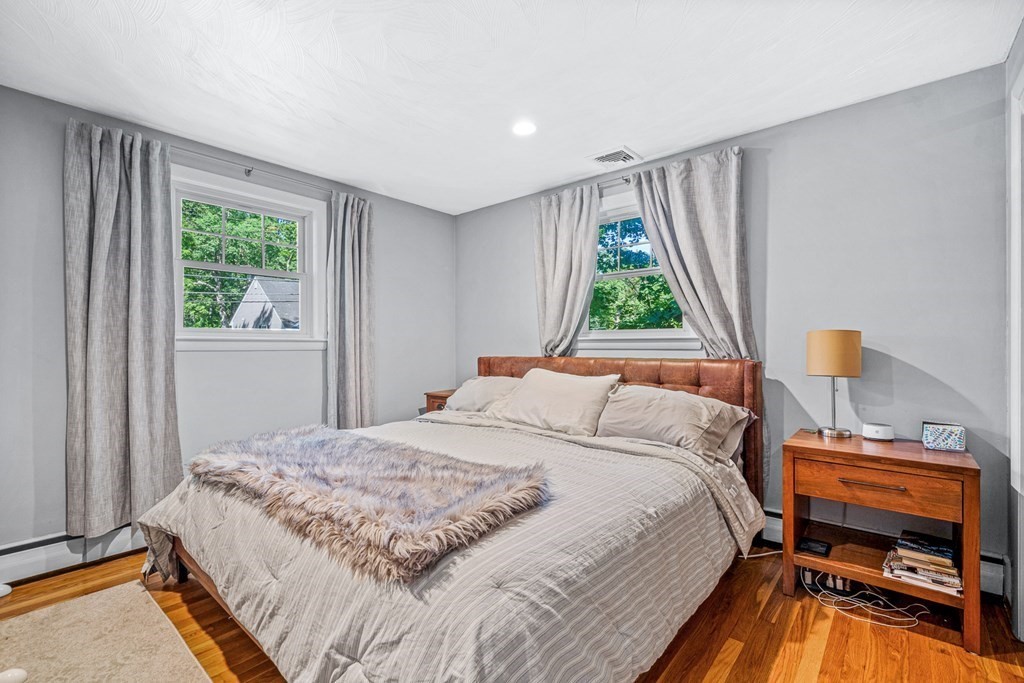 10 Winslow Road Natick, MA 01760 - Photo 9 of 20 a bedroom with a bed and a window
