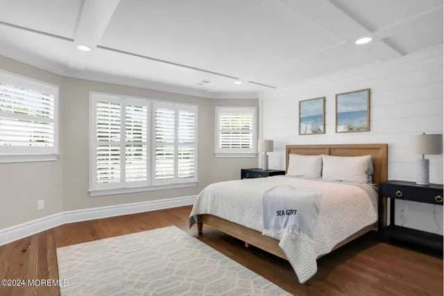 a bathroom with a double vanity sink and mirror