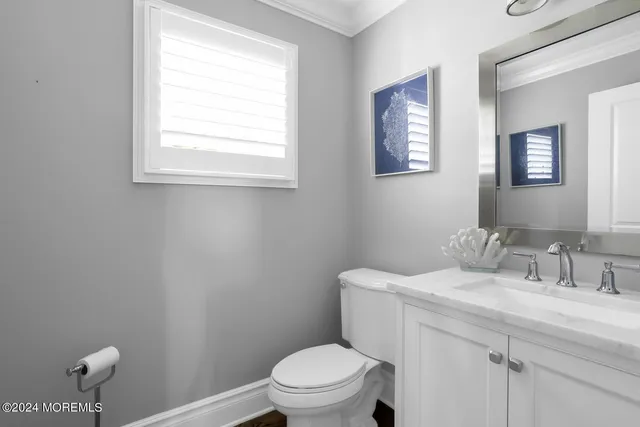 a view of staircase with wooden floor