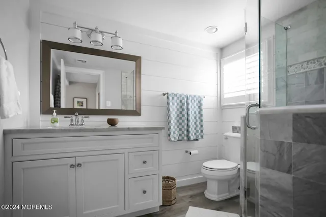 a view of a house with a yard and garden