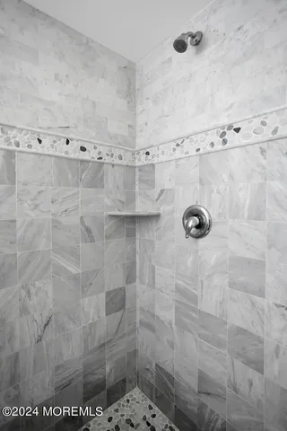 a view of a pathway with house on both side