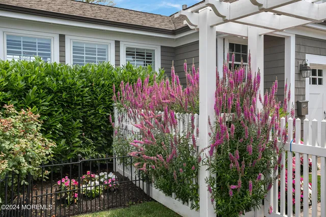a front view of a house with yard