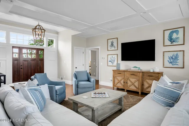 a bedroom with a bed and a night stand