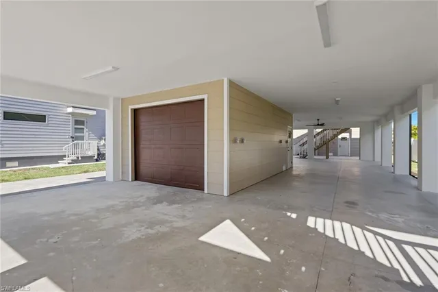 a view of a livingroom with a patio and a yard