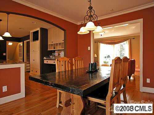 4727 Gaynor Road Charlotte, NC 28211 - Photo 3 of 8 a view of a dining room with furniture window and wooden floor