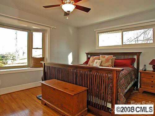 4727 Gaynor Road Charlotte, NC 28211 - Photo 5 of 8 a bedroom with furniture and a window