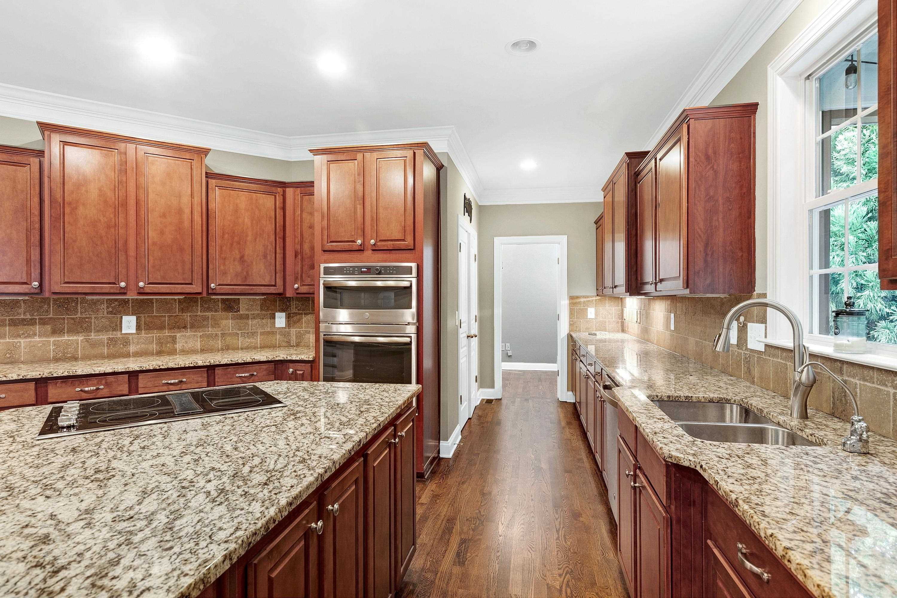 8431 Henderson Road Apex, NC 27539 - Photo 16 of 56 Lots of counter space in this kitchen