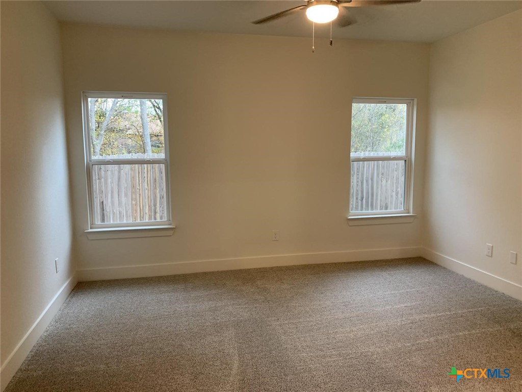 1862 Royal Loop Belton, TX 76513 - Photo 14 of 26 an empty room with a window