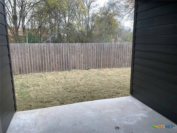 a view of wooden fence