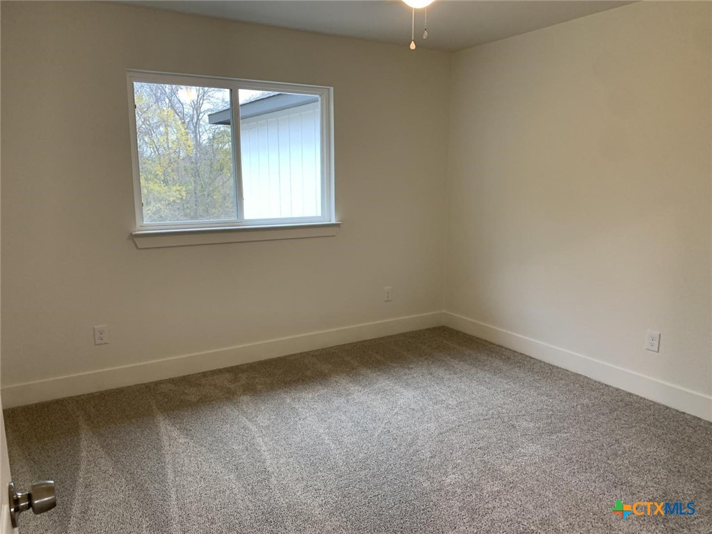 1862 Royal Loop Belton, TX 76513 - Photo 21 of 26 an empty room with a window