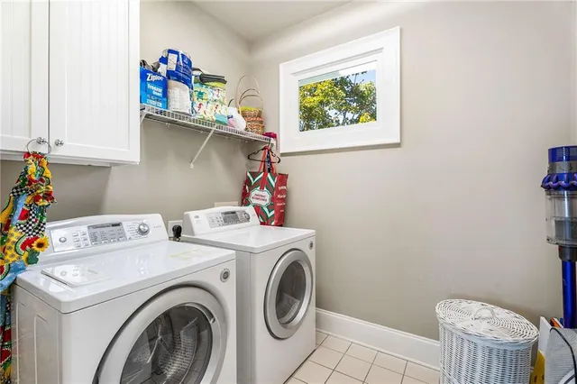 a bathroom with a granite countertop sink a toilet and bathtub