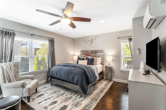 a backyard of a house with plants and trees