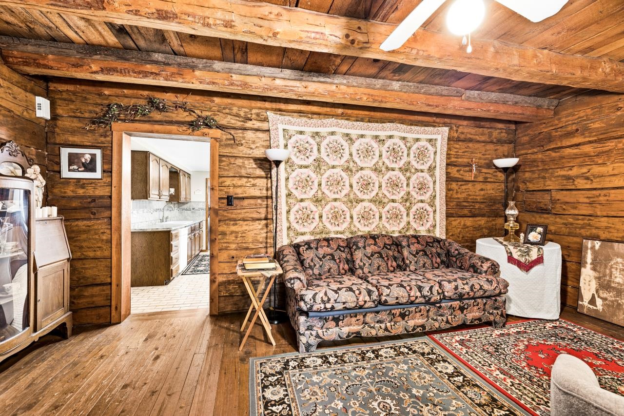 3723 Birchwood Road Kettle River, MN 55757 - Photo 23 of 48 Living room with a wooden ceiling with exposed beams and hardwood / wood-style floors