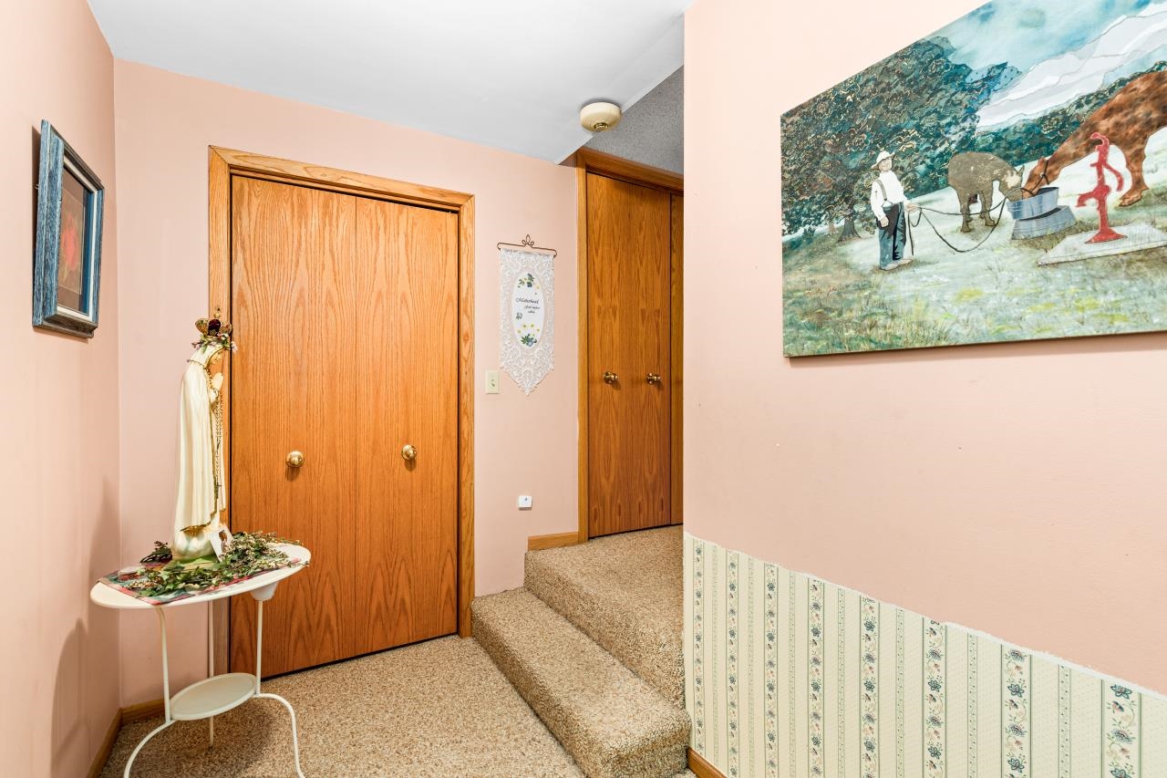 3723 Birchwood Road Kettle River, MN 55757 - Photo 30 of 48 Hall featuring stairs and carpet flooring