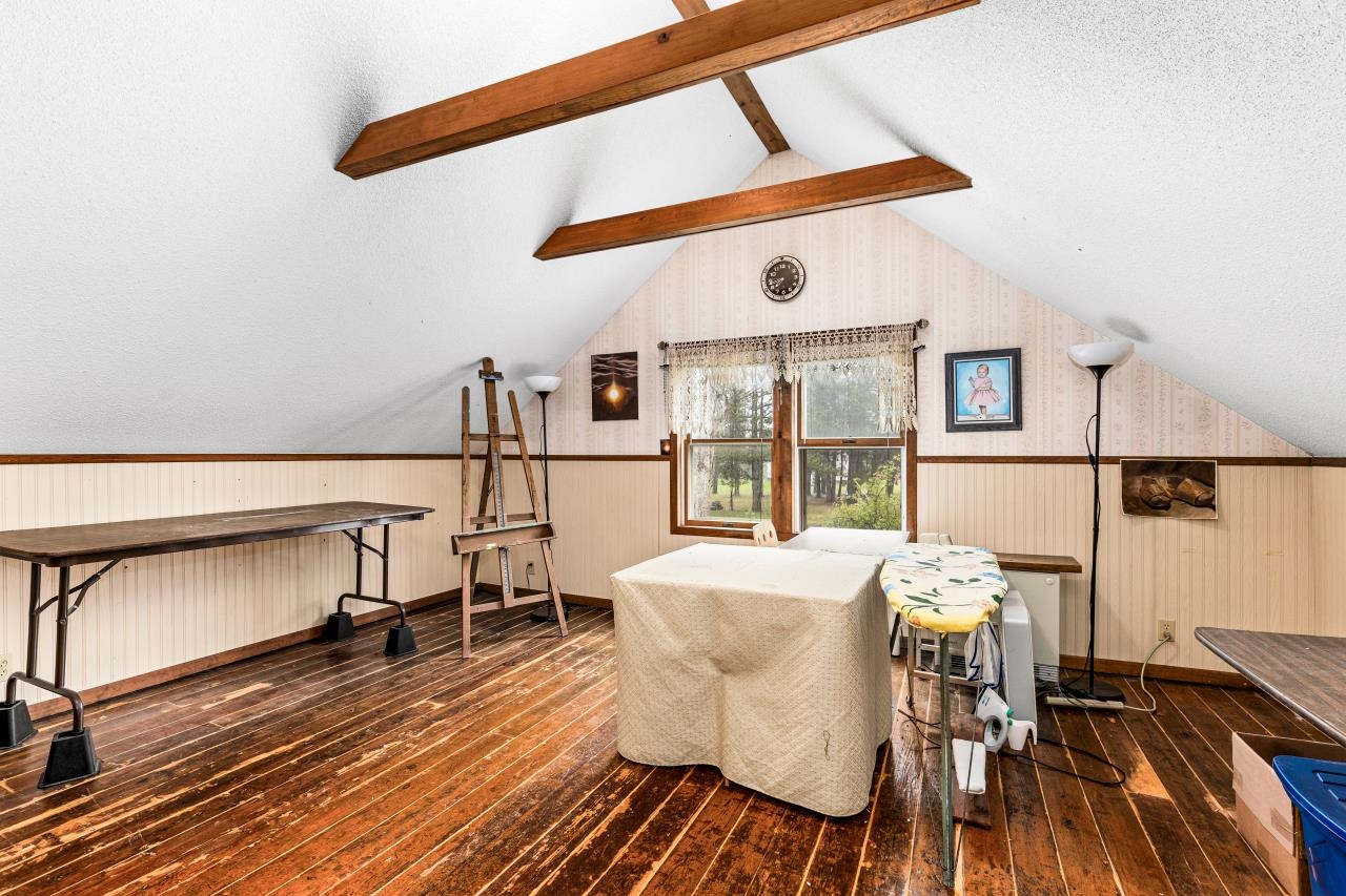 3723 Birchwood Road Kettle River, MN 55757 - Photo 35 of 48 Dining room featuring dark wood finished floors and a textured ceiling