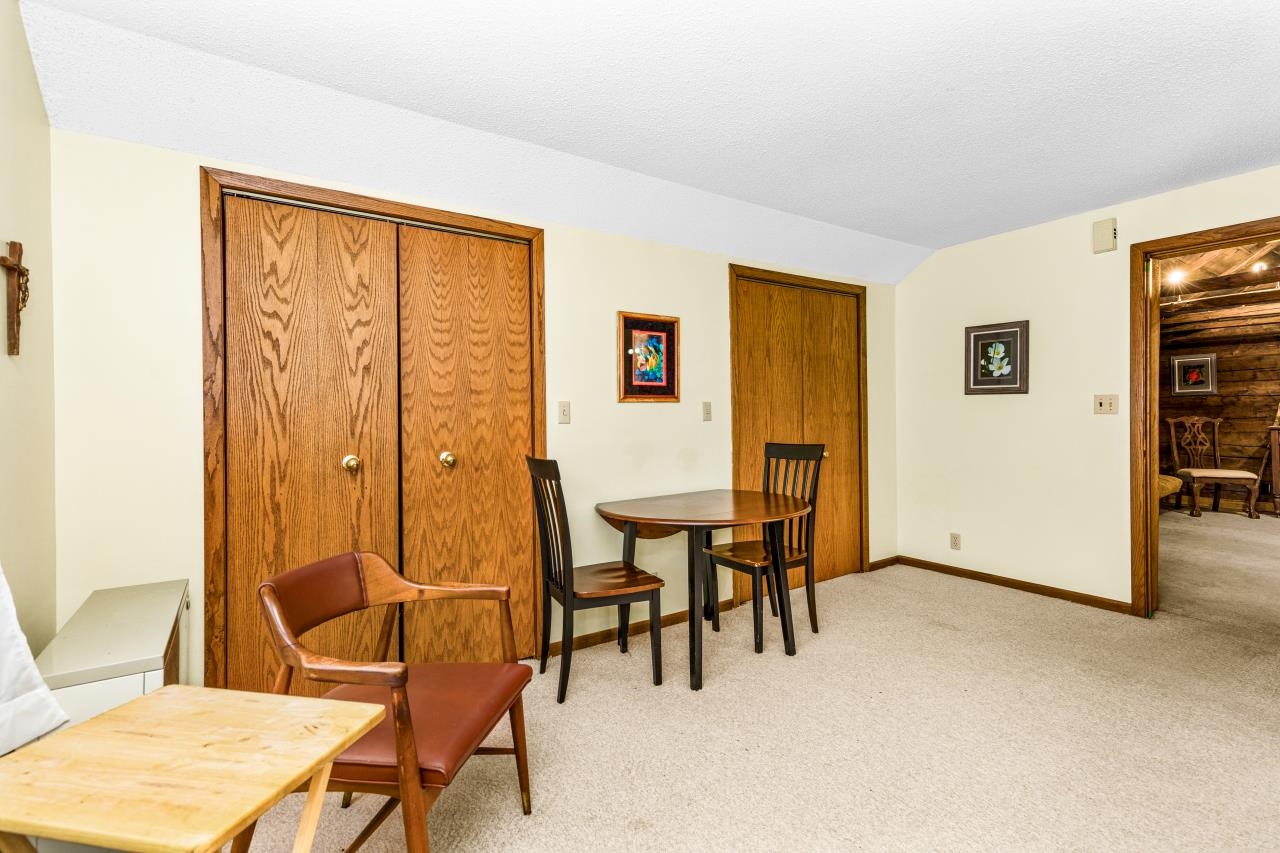 3723 Birchwood Road Kettle River, MN 55757 - Photo 43 of 48 Sitting room with light carpet and lofted ceiling