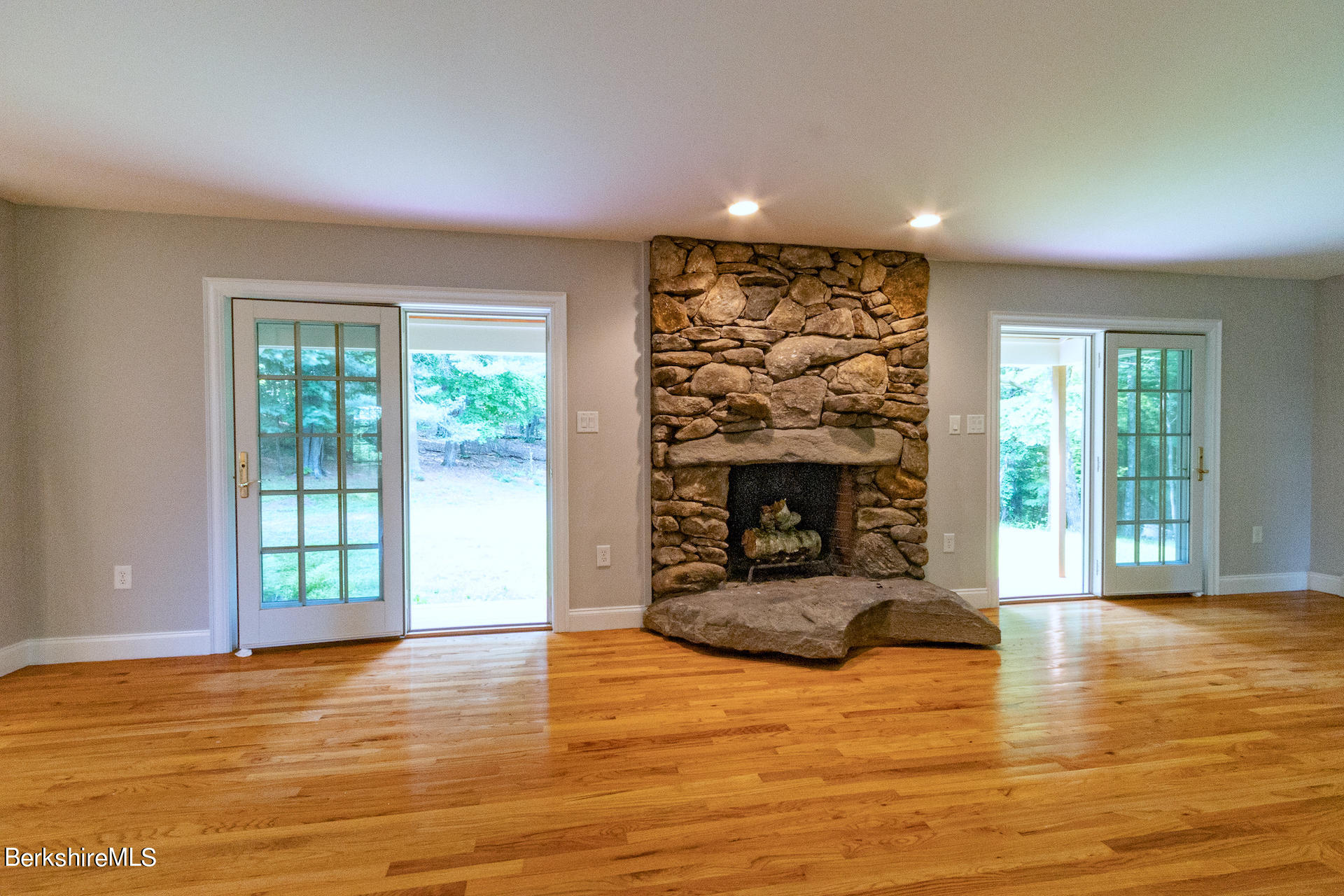 6 Oxbow Road Egremont, MA 01230 - Photo 14 of 42 a living room with furniture and a fireplace