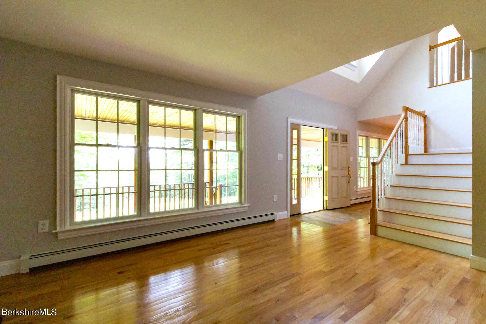 6 Oxbow Road Egremont, MA 01230 - Photo 18 of 42 a view of an empty room with wooden floor and a window