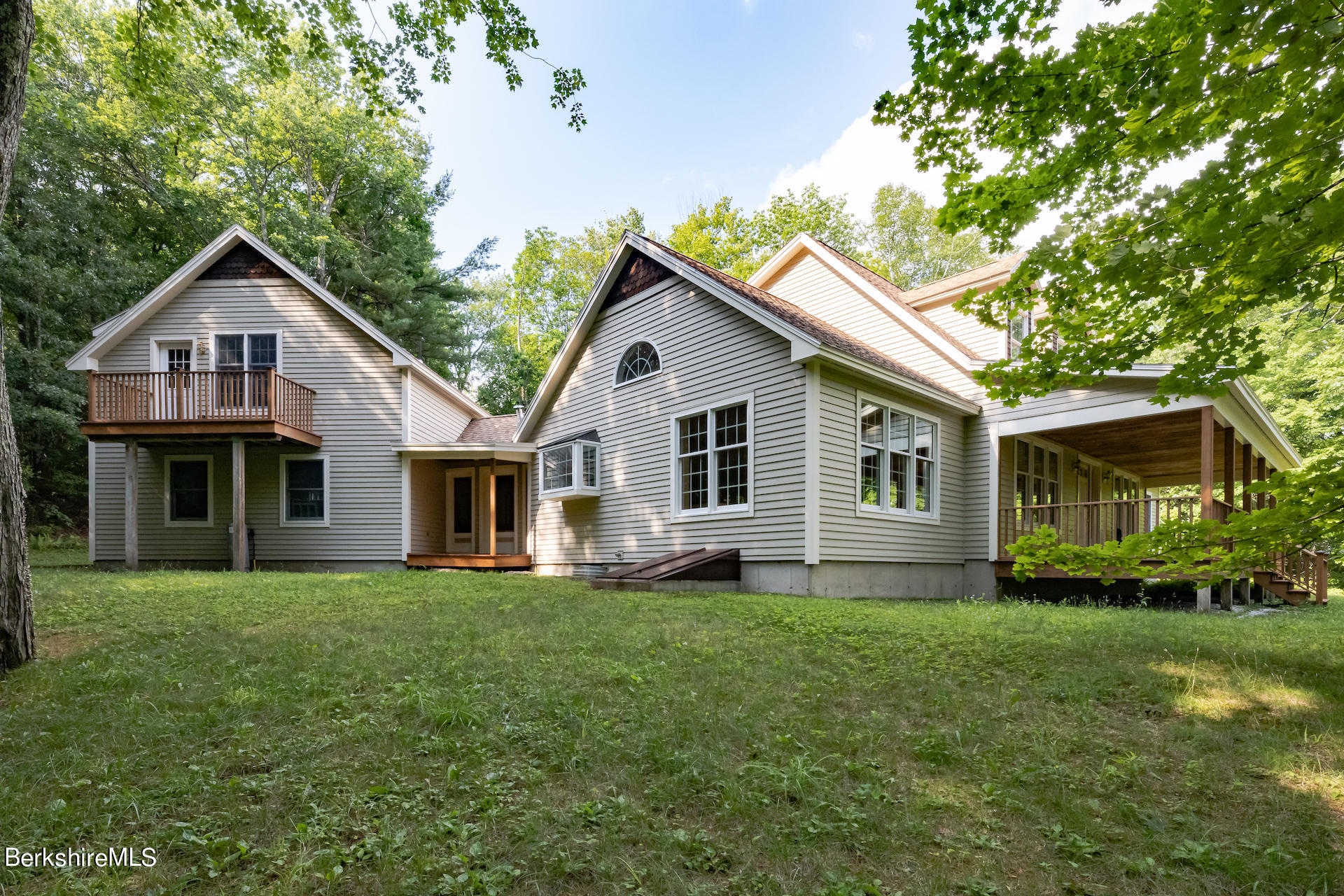 6 Oxbow Road Egremont, MA 01230 - Photo 3 of 42 a front view of house with yard and green space