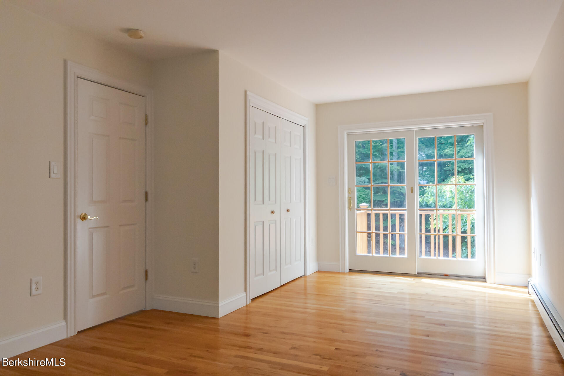 6 Oxbow Road Egremont, MA 01230 - Photo 26 of 42 a view of an empty room with wooden floor and a window