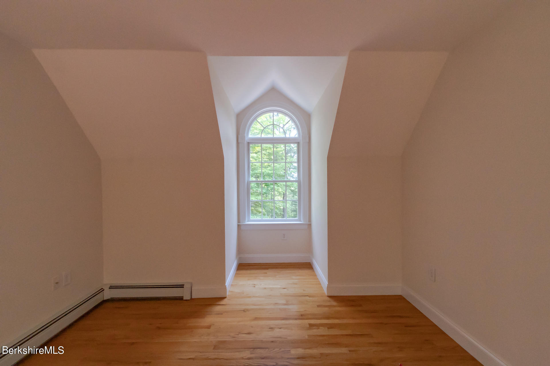 6 Oxbow Road Egremont, MA 01230 - Photo 29 of 42 a view of empty room with wooden floor and fan