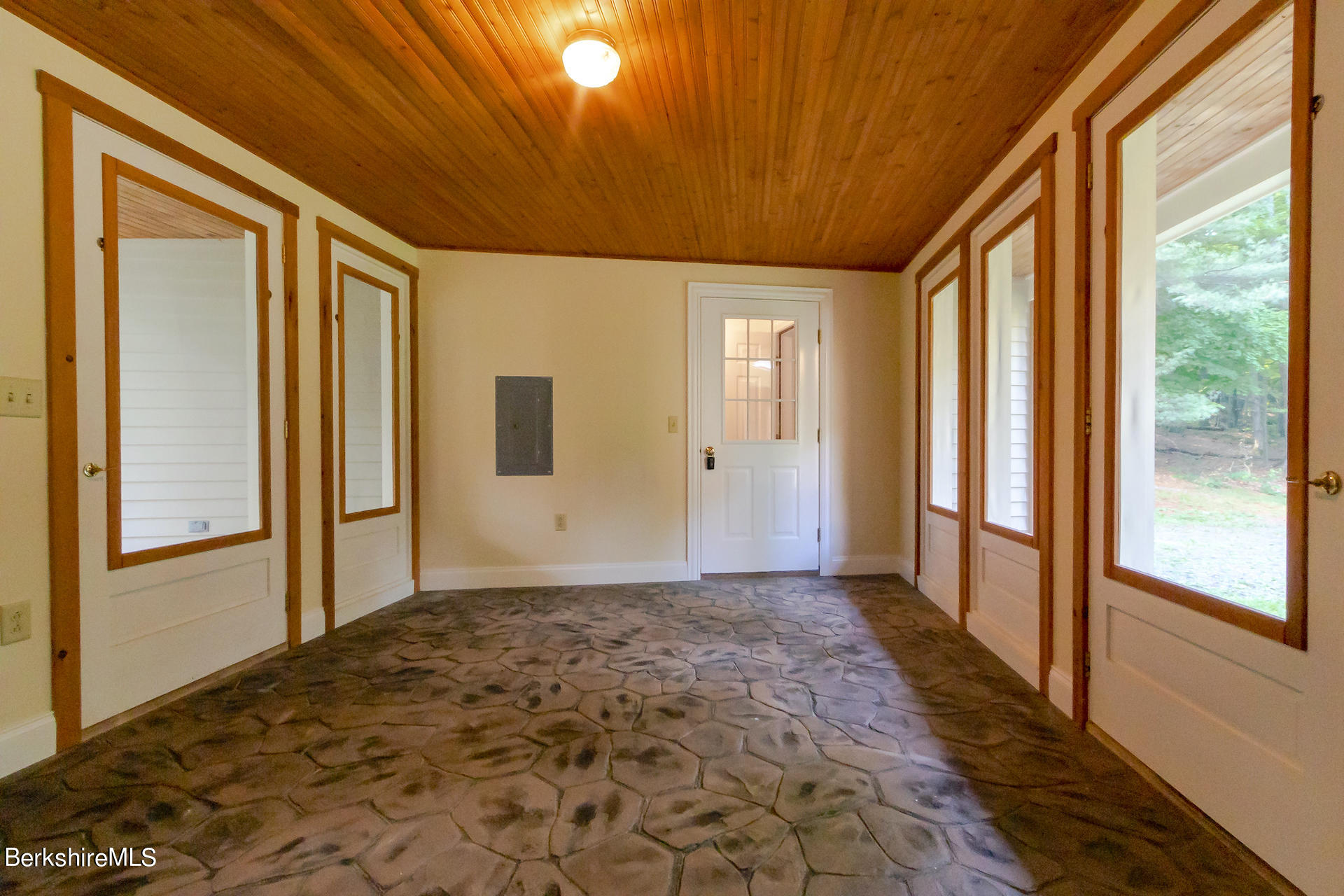 6 Oxbow Road Egremont, MA 01230 - Photo 31 of 42 a view of hallway with a large window and chandelier