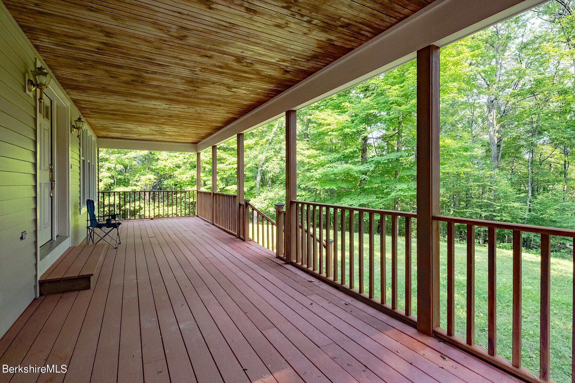 6 Oxbow Road Egremont, MA 01230 - Photo 6 of 42 a view of a wooden deck with a yard