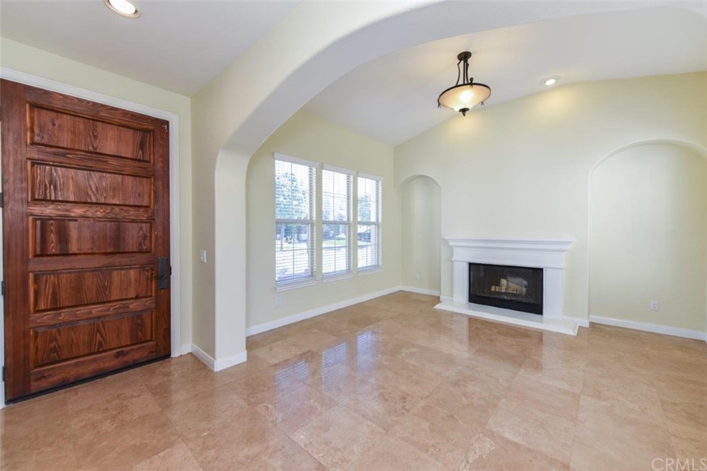 19 Ferrand Newport Coast, CA 92657 - Photo 11 of 74 an empty room with windows and fireplace