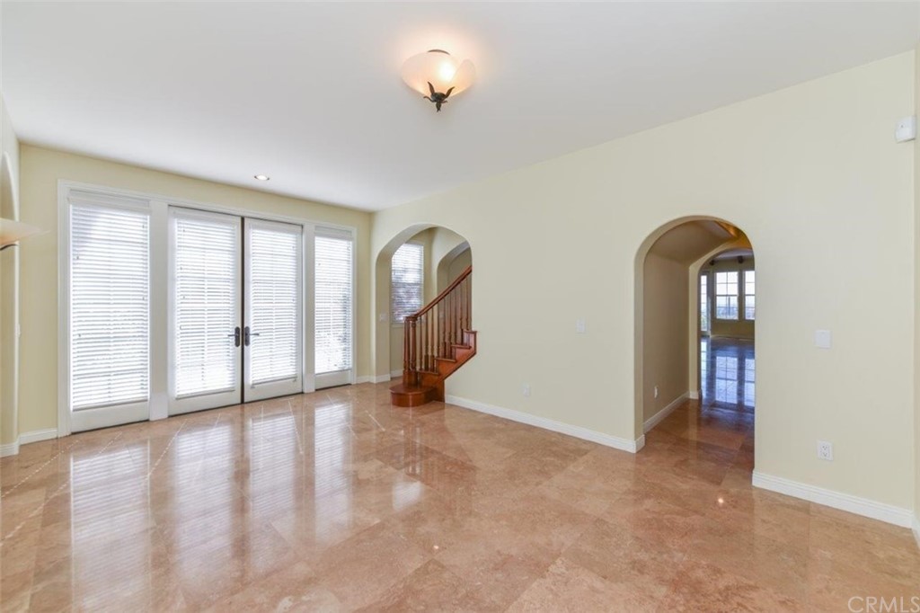 19 Ferrand Newport Coast, CA 92657 - Photo 15 of 74 an empty room with windows and exposed view
