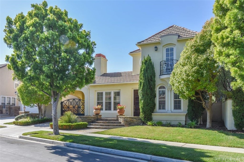 19 Ferrand Newport Coast, CA 92657 - Photo 4 of 74 a front view of a house with a yard