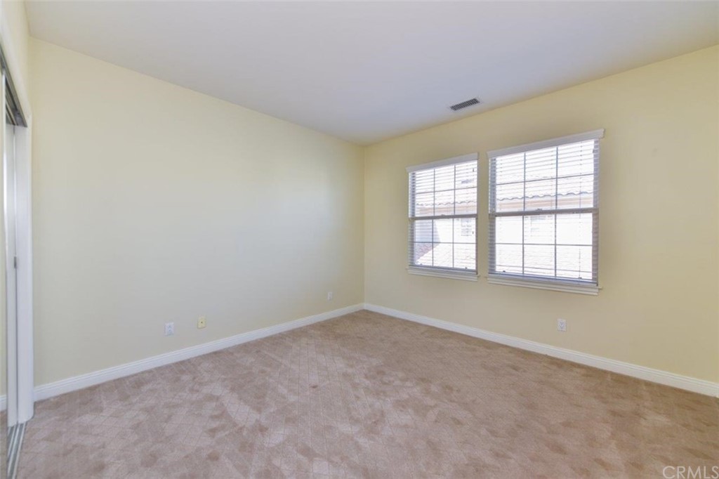 19 Ferrand Newport Coast, CA 92657 - Photo 46 of 74 an empty room with windows