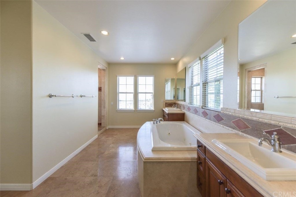 19 Ferrand Newport Coast, CA 92657 - Photo 50 of 74 a view of a sink and window with wooden floor