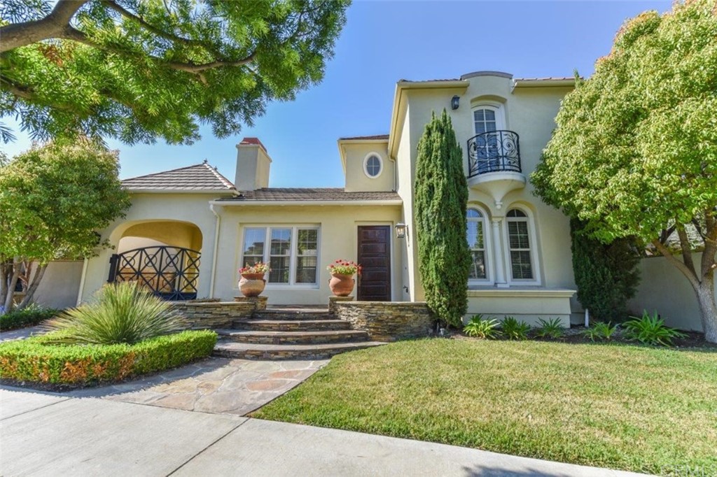 19 Ferrand Newport Coast, CA 92657 - Photo 5 of 74 front view of a house with a yard